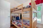Main level bunk room with a twin bunk bed